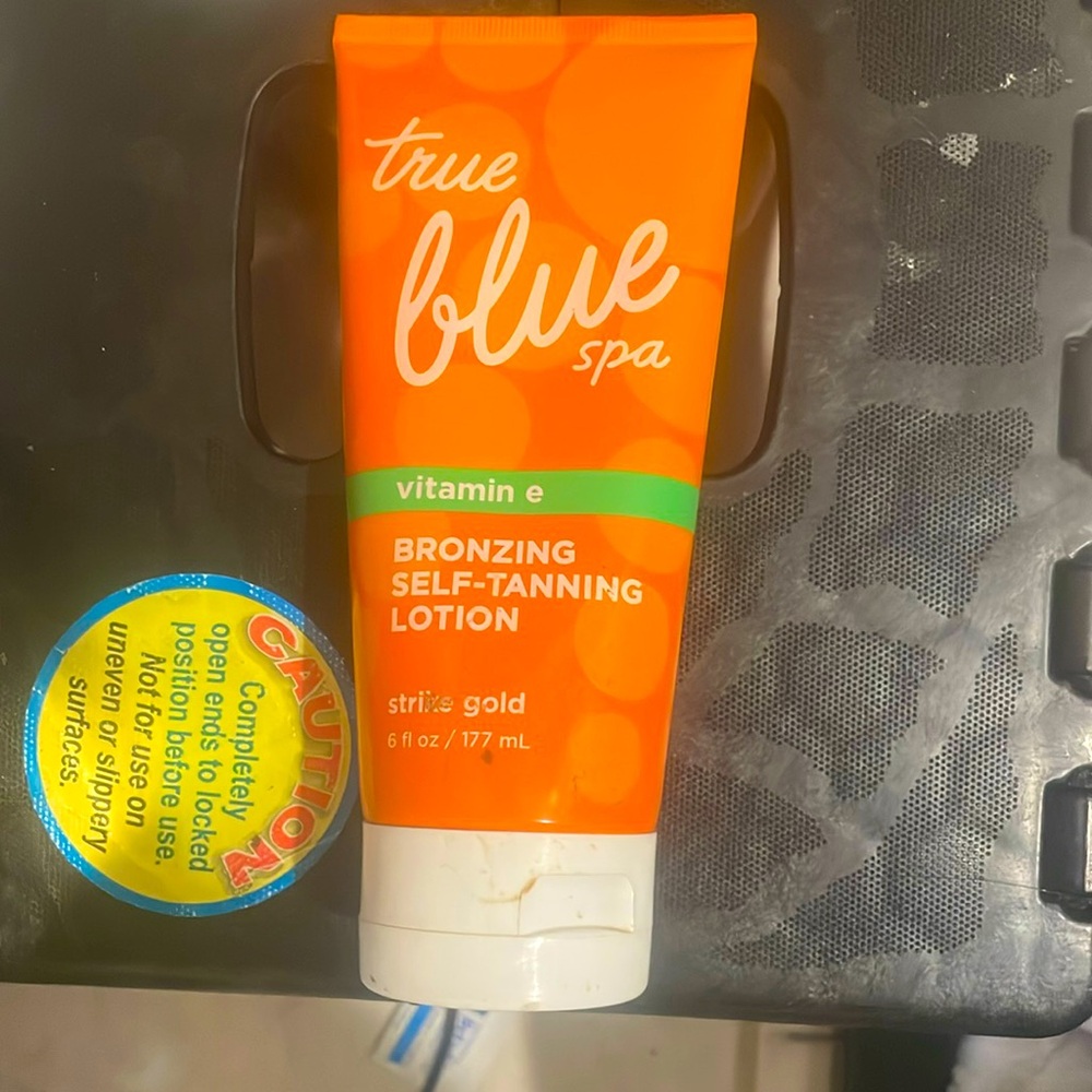 True blue spa strike gold bronzing self-tanning lotion
